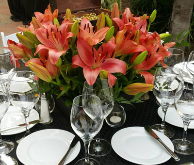A beautiful floral centertpiece for a dinner for Loreal cosmetics